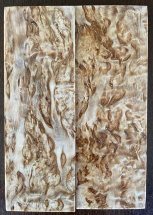 Stabilized handle wood , Curly birch scales. Dimensions 10x47x136mm