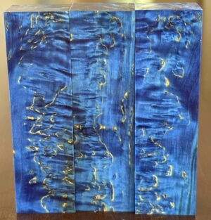 Blue dyed and stabilized Karelian Masur birch wood.